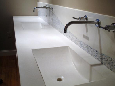 white integral double concrete sink vanity with backsplash