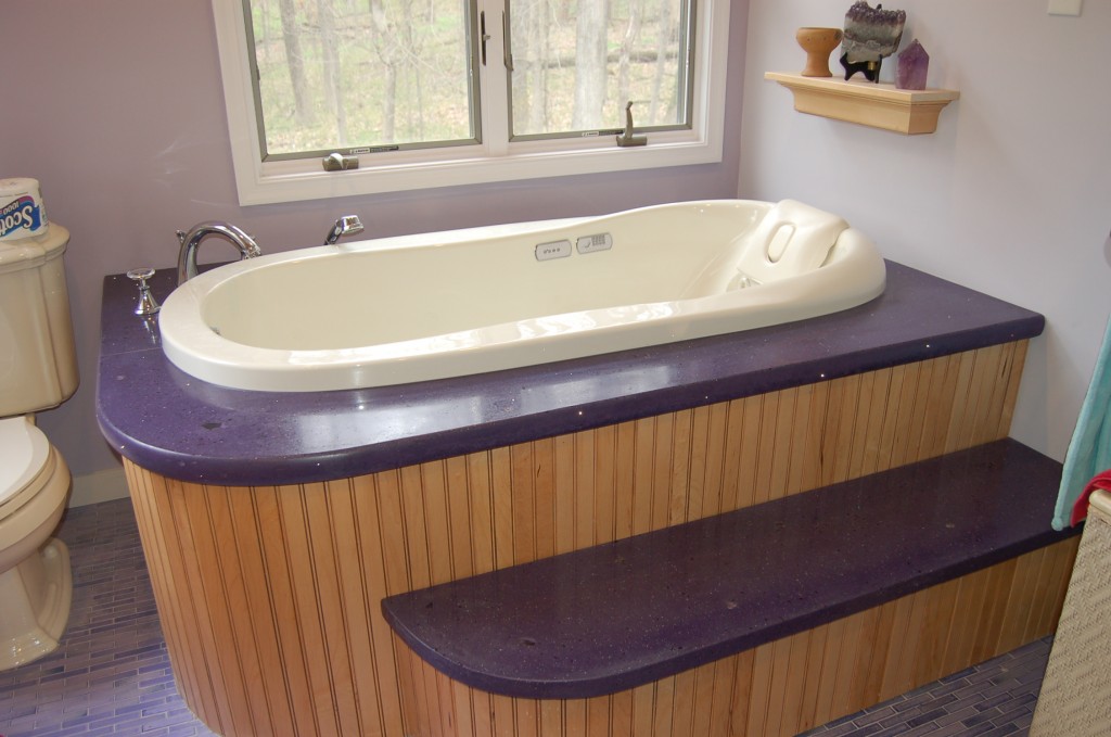 purple concrete tub surround with fiber optics and embedded amethyst