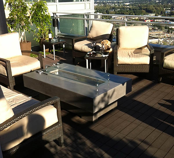 rectangular concrete fire pit on rooftop