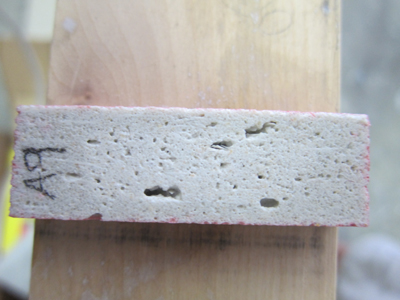 photograph of bugholes pinholes due to entrapped air in GFRC concrete