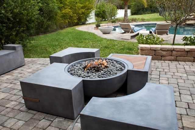 interlocking concrete furniture and concrete fire pit with wood insert