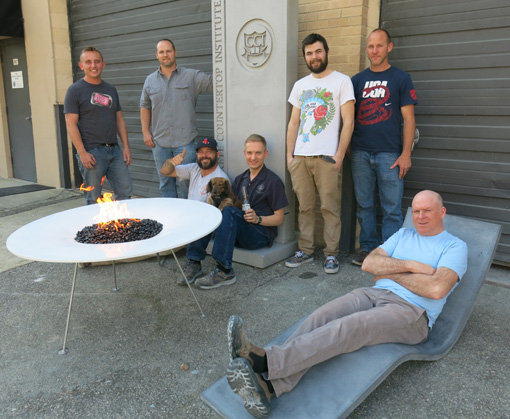 concrete and wood dovetail bench