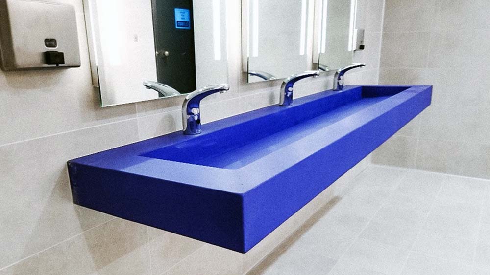 bright blue concete ramp sink by Lawson Design in NC