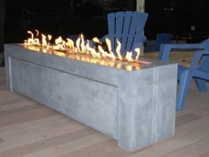 This modern inspired concrete fire pit is the perfect place to warm up on a chilly New Jersey night.