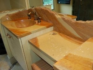 streaked concrete vanity integral sinks and stone edge backsplash by Liquid Stone in PA