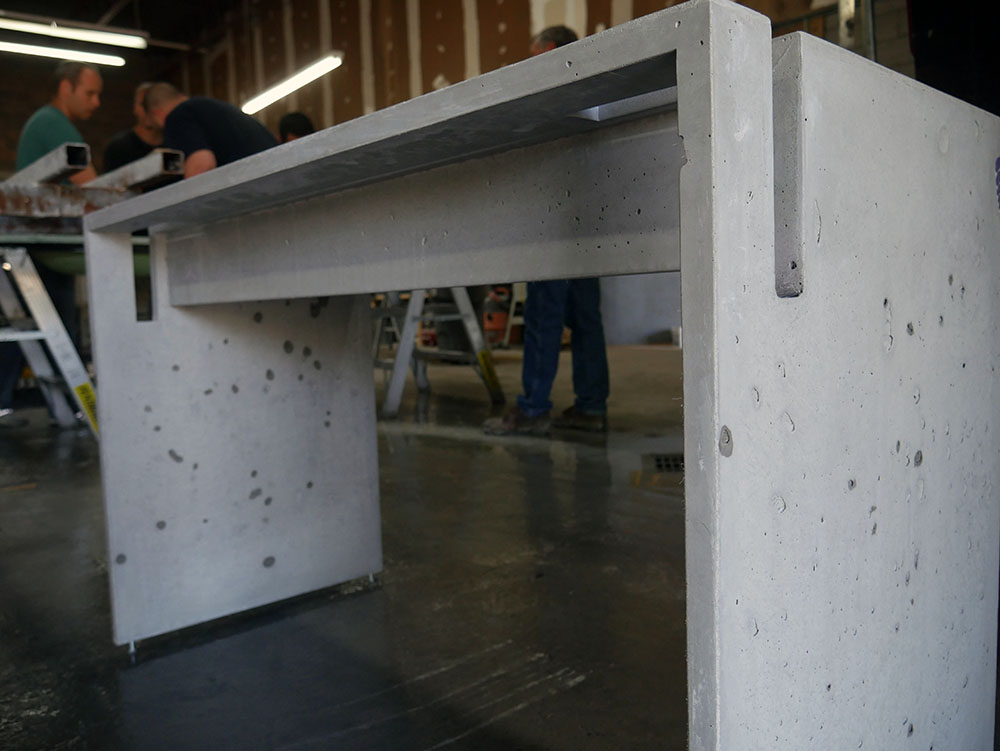 bugholes-in-concrete-desk-design