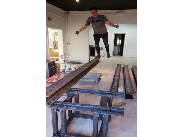 assembling steel support for cantilevered concrete table