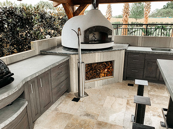 outdoor kitchen concrete countertop pizza oven