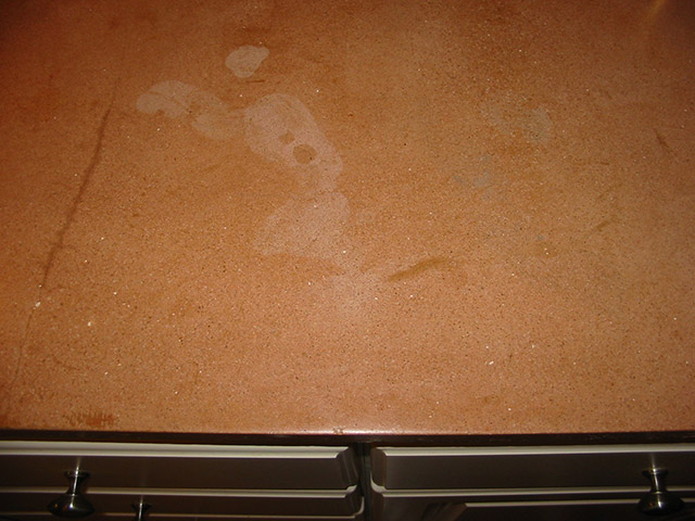 water marks on waxed concrete countertop