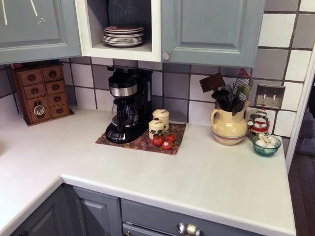 white concrete countertop kitchen sealed with Omega Concrete Countertop Sealer