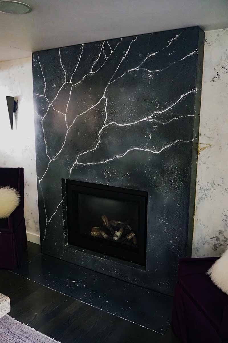 veined concrete fireplace surround by Elements Concrete Cape Cod