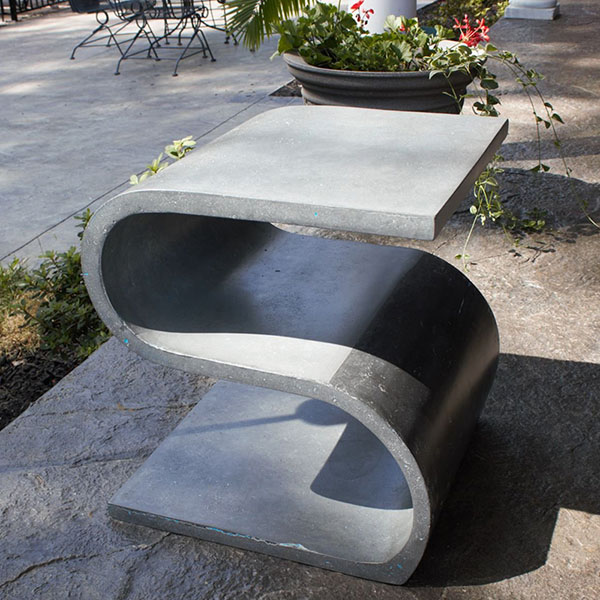 S shaped concrete chair