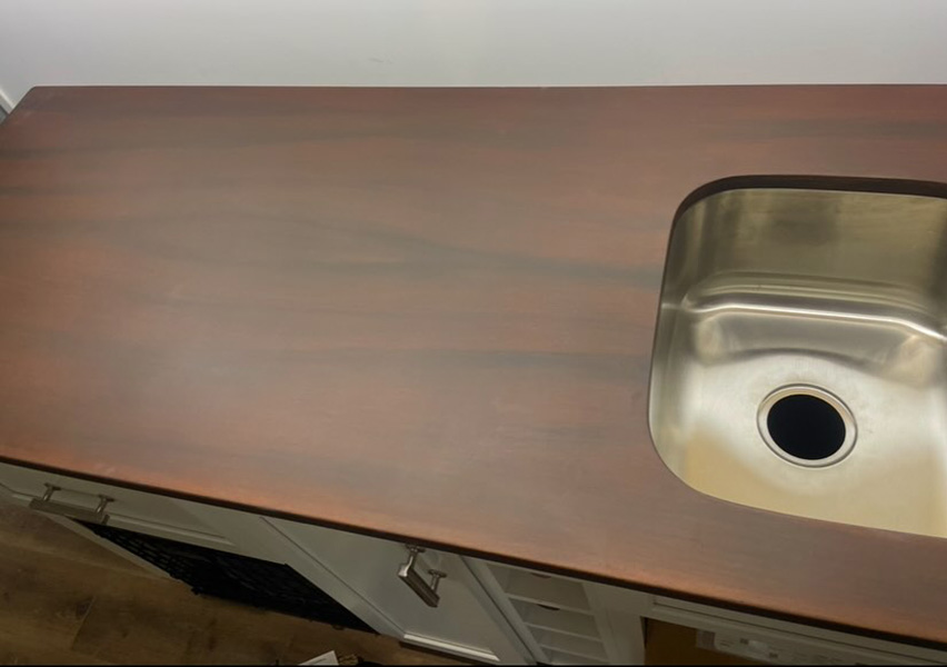 wood look concrete countertop with sink