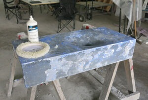 Wool polishing pad and cutting compound selected for polishing