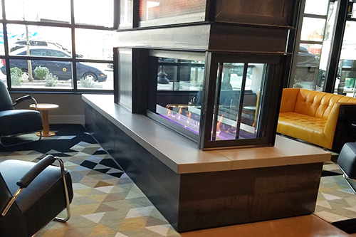 concrete fireplace hearth glass by Hyde Concrete